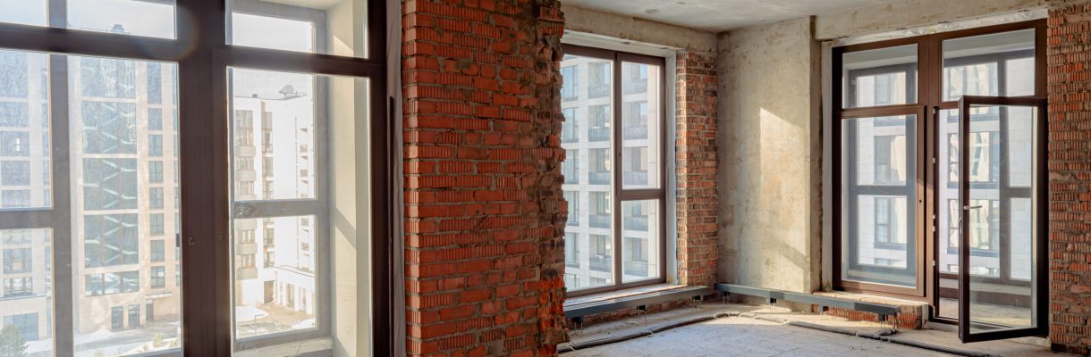 Repair and restoration of apartments. Red brick walls, concrete floors